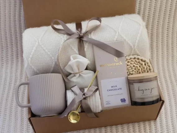 curated bridal shower hostess gift basket with spa items and snacks