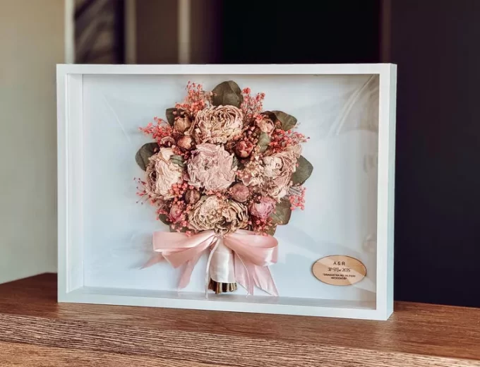 Bridal bouquet dried and preserved inside a shadowbox