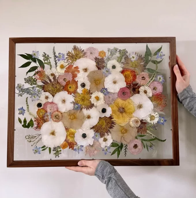 Large wedding flower art made from pressed bouquet petals