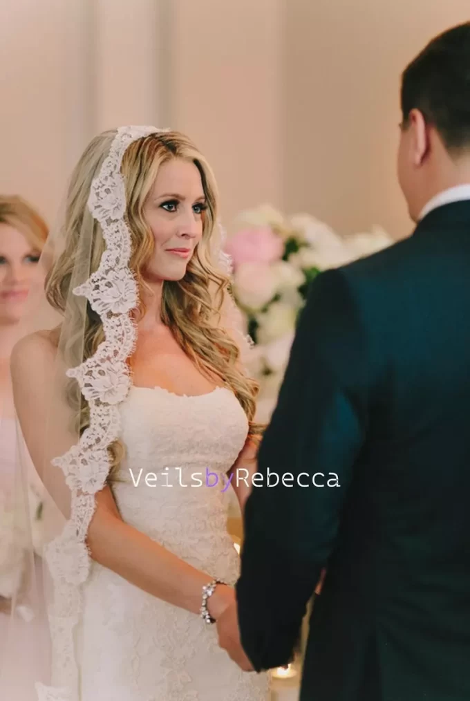 1-tier mantilla veil worn on bride at ceremony