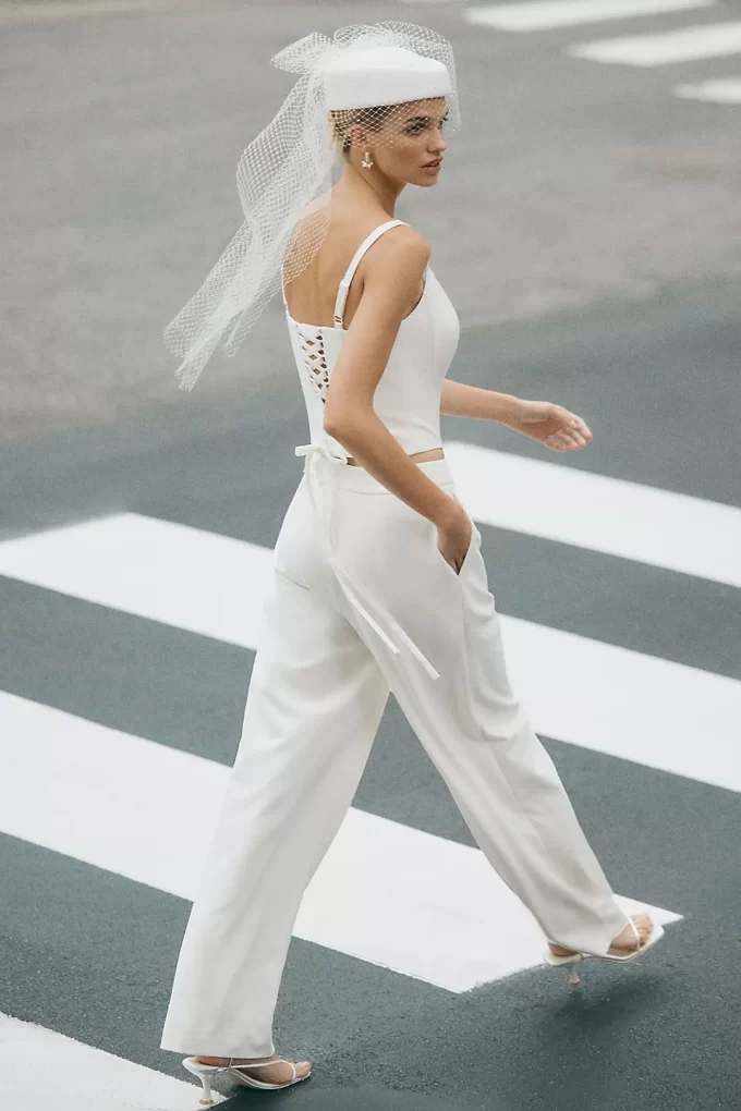 City wedding bridal suit and veil hat