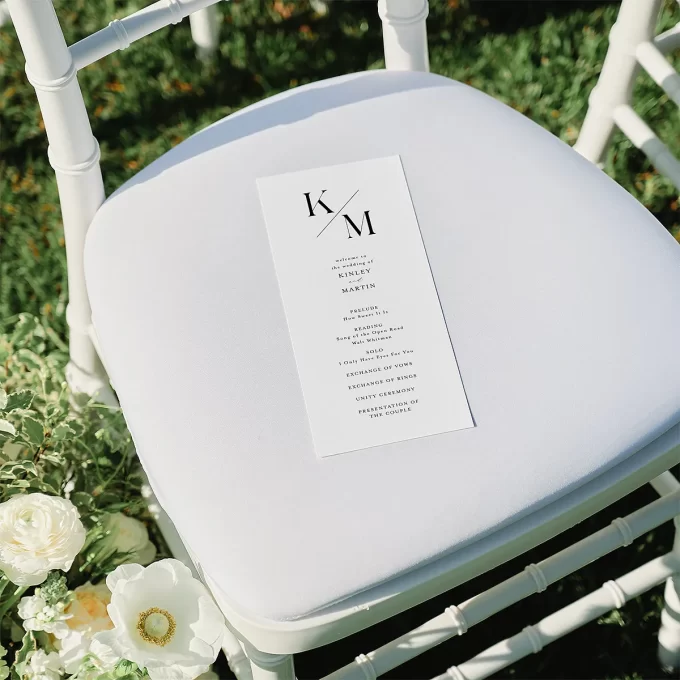 Wedding ceremony program with monogrammed initials