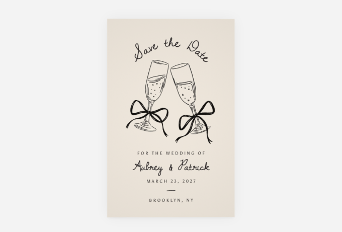save the date card from vistaprint with champagne flutes and  bows