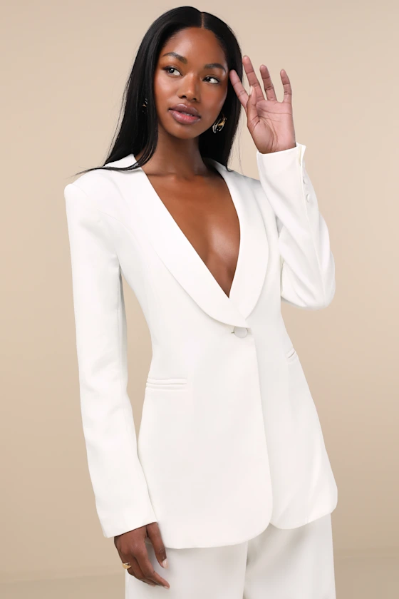 Bride wearing white suit