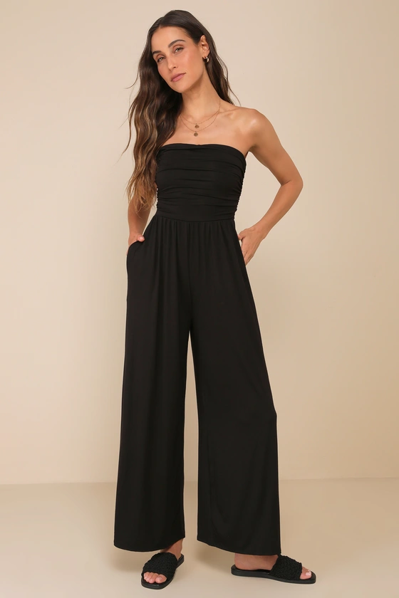 bridesmaid wearing a jumpsuit while getting ready