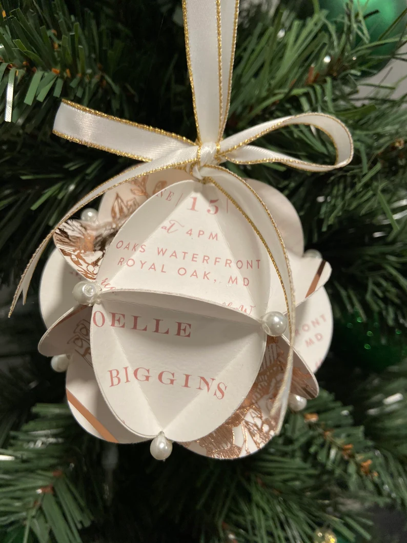 Invitation paper ornament for a first wedding anniversary