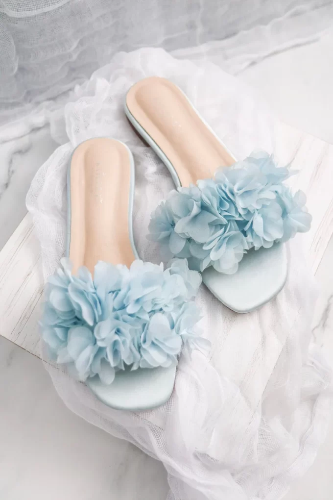 Light blue ruffle slip on sandals for the bride