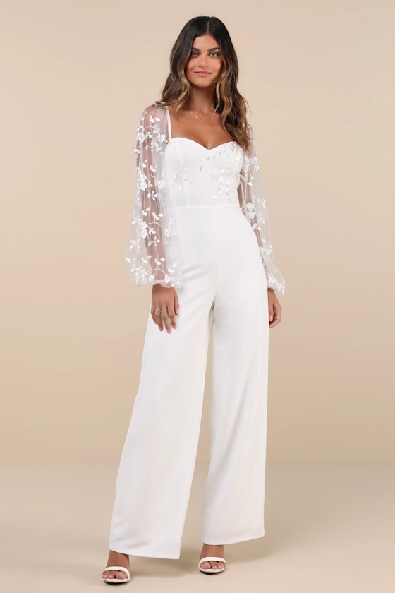 White jumpsuit with illusion tulle sleeves
