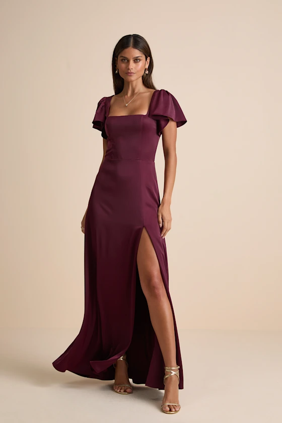 plum jewel tone bridesmaid dress with a flutter sleeve