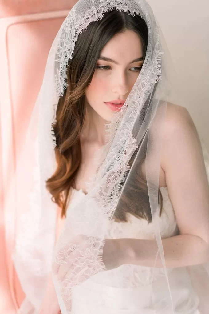 Up close of bridal mantilla veil