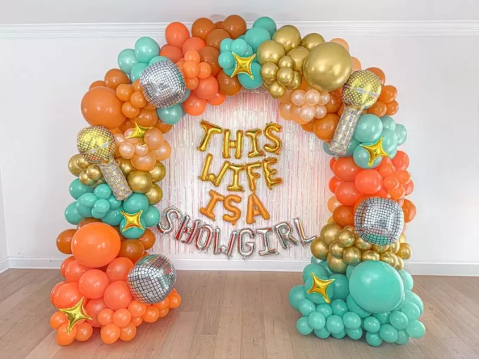 Wife is a showgirl backdrop balloon arch