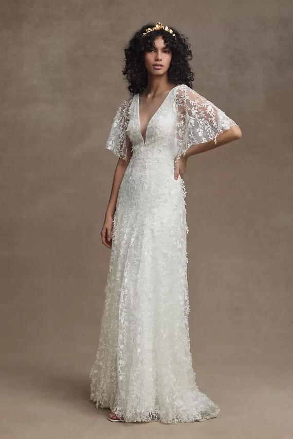 Boho lace bridal gown with convertible sleeves