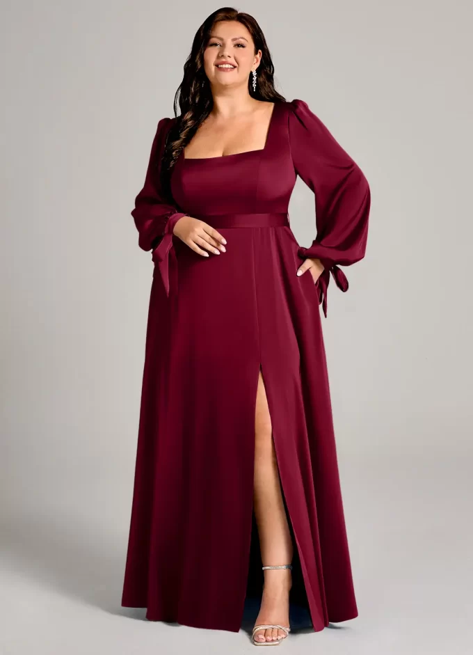 Bridesmaid modeling long sleeve burgundy bridesmaid dress in plus size with long length and bow ties at the cuff