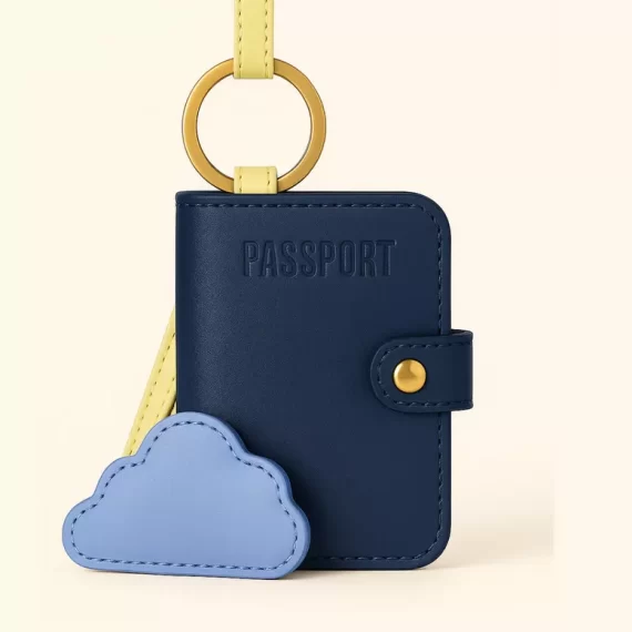 Cincha travel bag charm with clouds