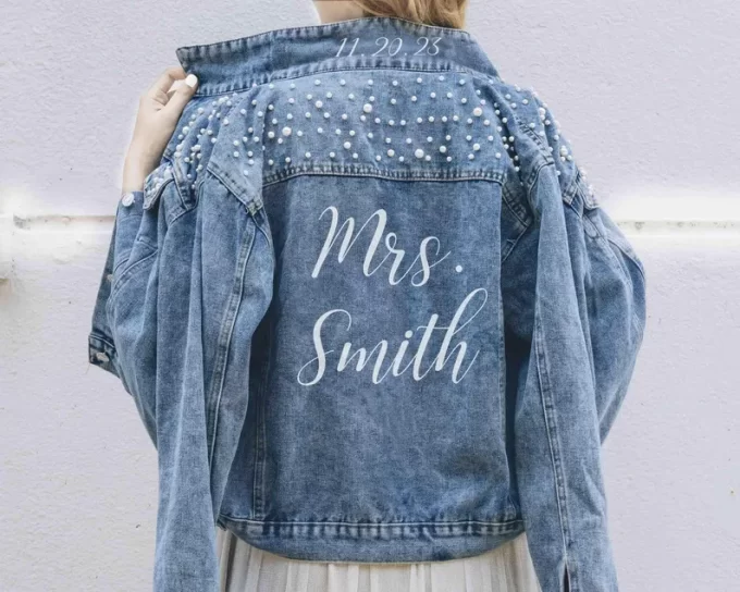 Classic blue denim bridal jacket with pearls and embroidery for casual weddings