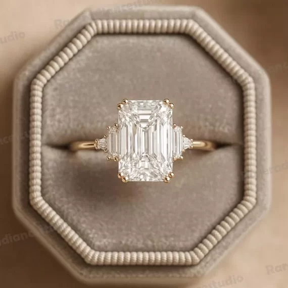 Emerald cut moissanite ring in cushion velvet ring box