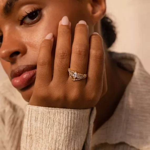 Set of fake wedding rings for travel displayed on hand
