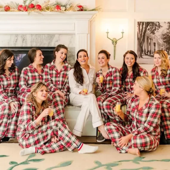 Bridesmaids getting ready in matching plaid flannel pajamas