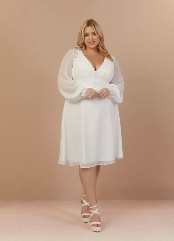 Flowy chiffon wedding reception gown skims over belly for a flattering fit