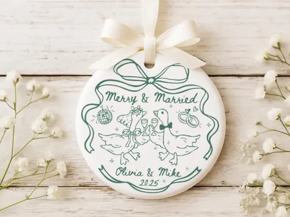 happy geese first married ornament on etsy with merry and married; personalized with newlyweds name and date