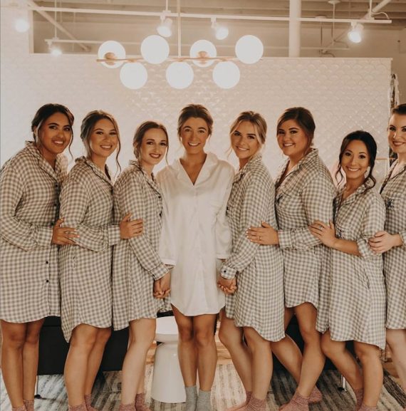 Bridesmaids wearing grey flannel pajama shirts