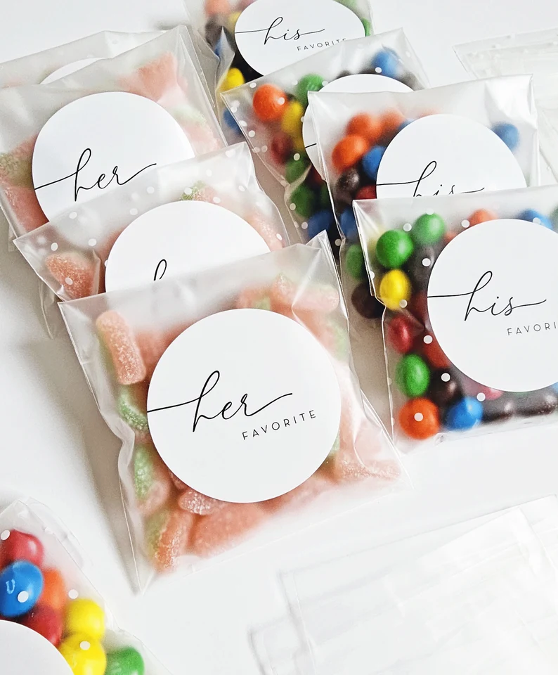 His & Hers wedding favor bags filled with personalized candies for guests