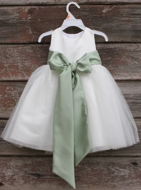 flower girl dress handmade on Etsy with lace and tulle featuring a colorful bow sash in your choice of color
