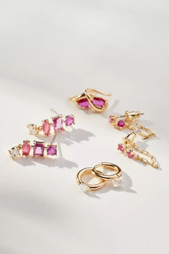 Four pairs of ruby birthstone earrings for July