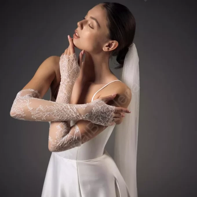 Lace gloves that can look like detachable wedding dress sleeves