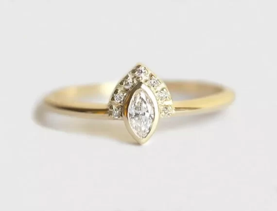 marquise engagement ring with pave diamonds