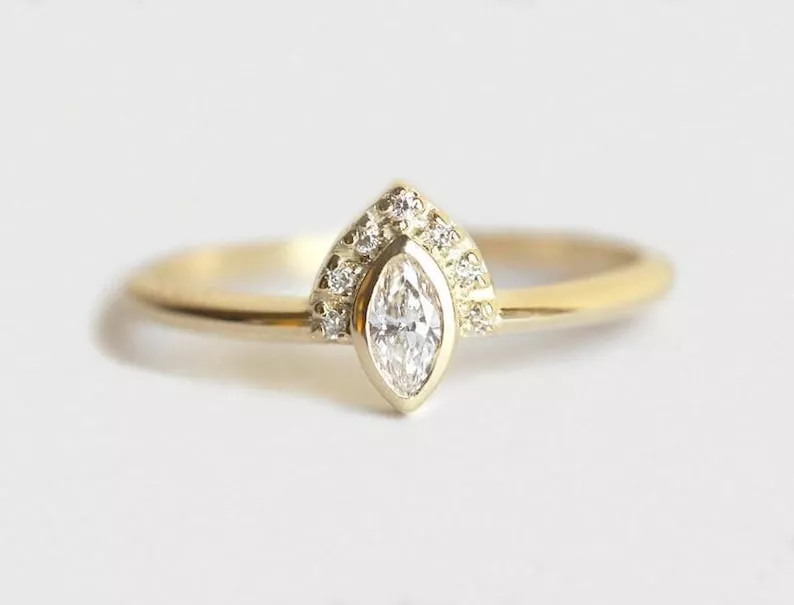 marquise engagement ring with pave diamonds