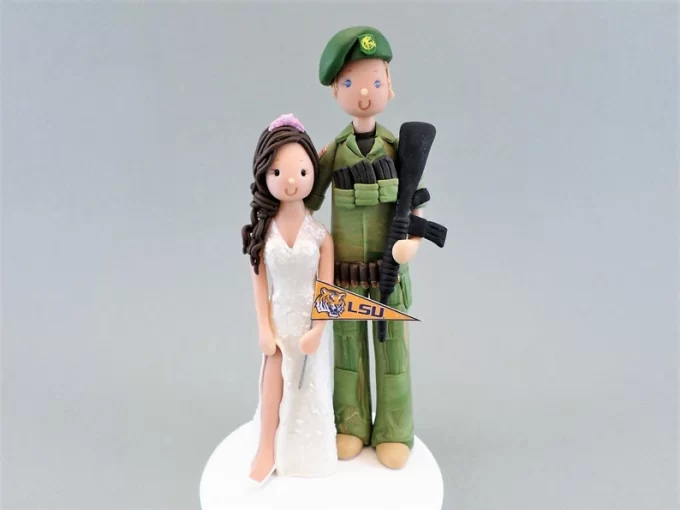 army figurine wedding cake topper with bride and groom in uniform
