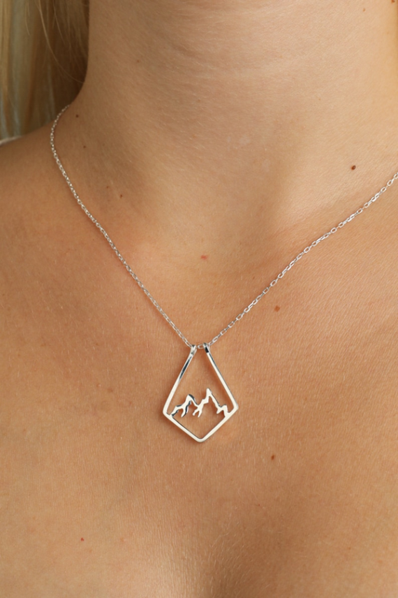 Mountain range-style ring holder necklace for holding an engagement ring