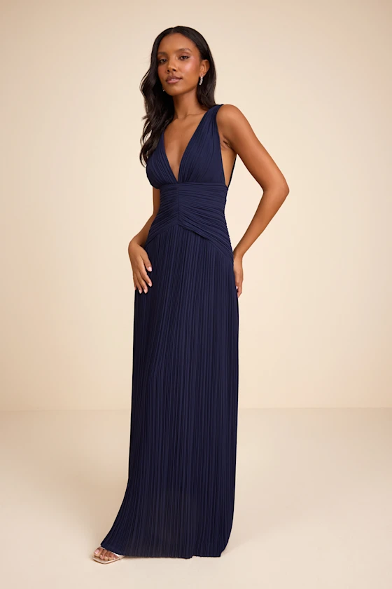 Pleated drop waist navy maxi dress for winter wedding guest outfit