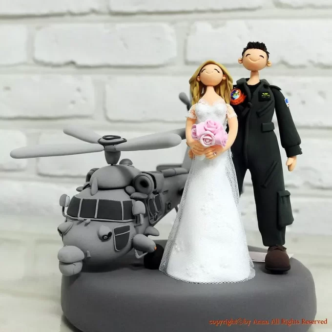 Realistic wedding cake topper people in various military uniforms