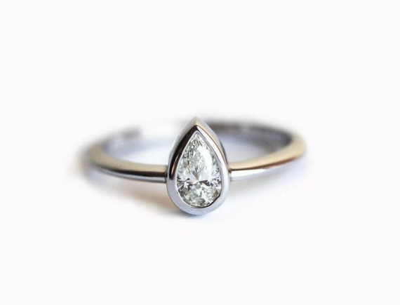 simple engagement ring with pear shape diamond