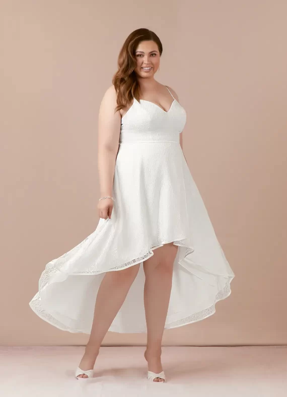 Plus-size A-line lace reception dress designed to hide belly and enhance curves
