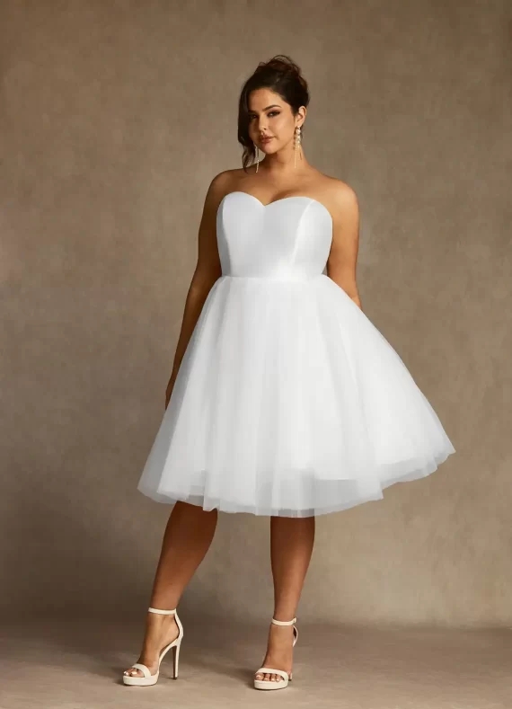 Close-up of tulle satin A-line reception dress with sweetheart neckline to hide tummy