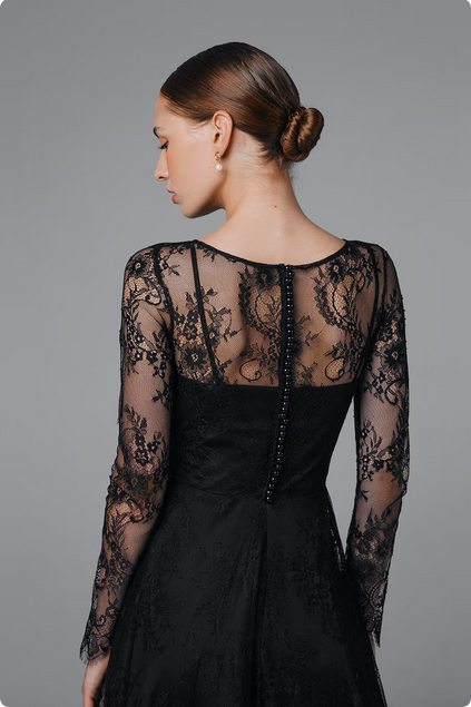 black boho alternative wedding dress with lace back and long sleeves