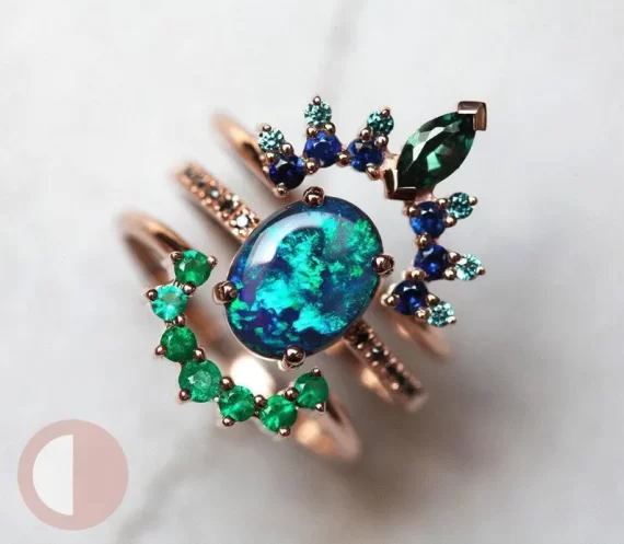 Black opal engagement ring set as a durable non-diamond alternative to a diamond ring