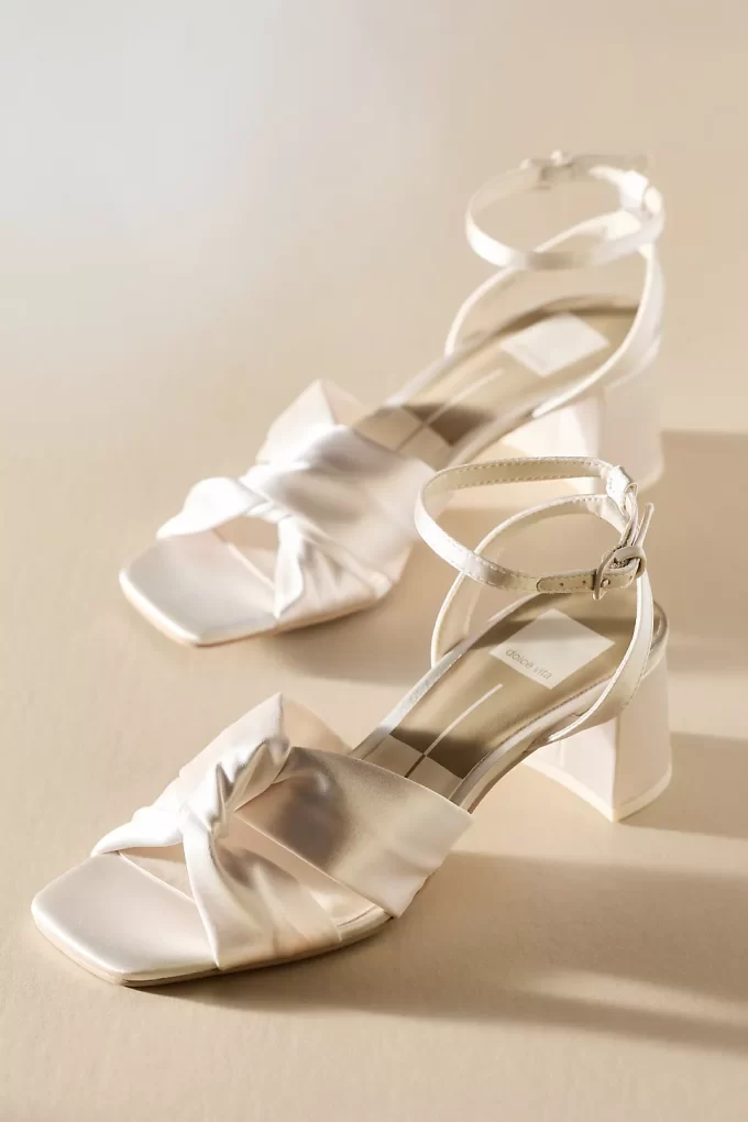 dolce vita ankle strap wedding shoes with comfortable low heel and shiny ivory satin