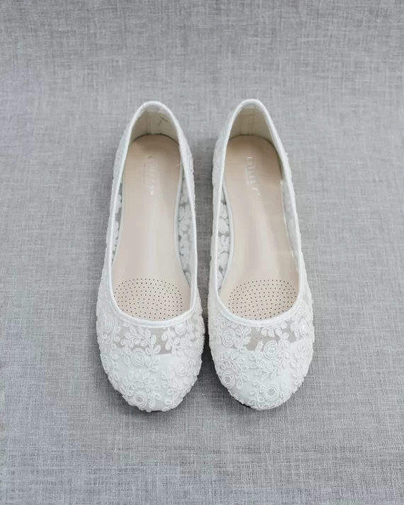Rounded toe ballet flats made of lace to pair with lace wedding dress