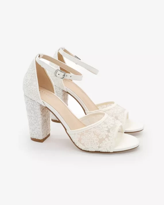 Close-up of lace wedding heels showcasing intricate lace details and elegant design