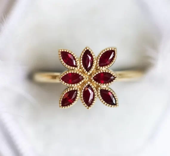 Marquise style non diamond engagement ring with ruby