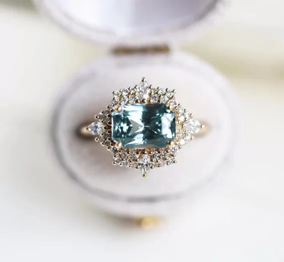 Mint colored sapphire ring in a vintage-inspired setting
