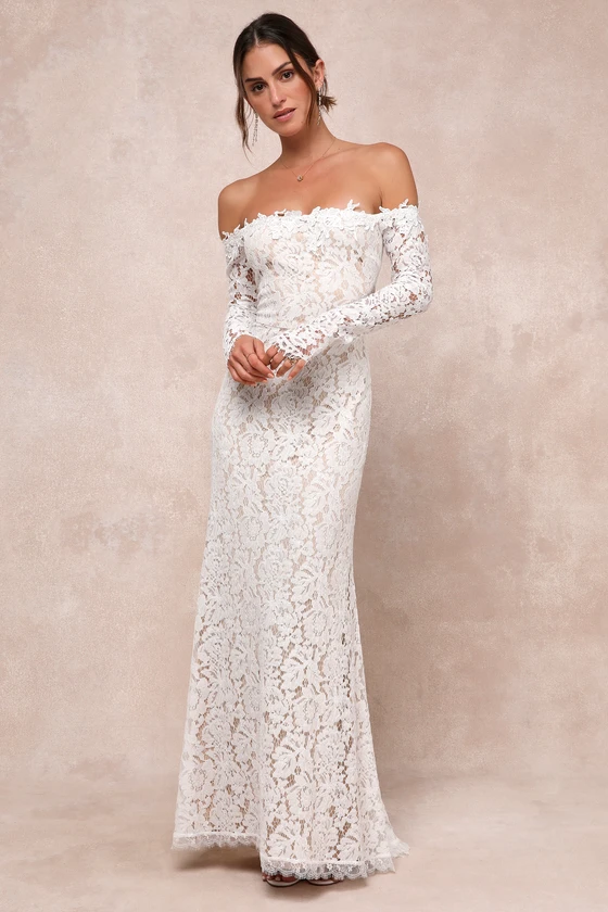 Lace off-the-shoulder wedding dress worn by bride
