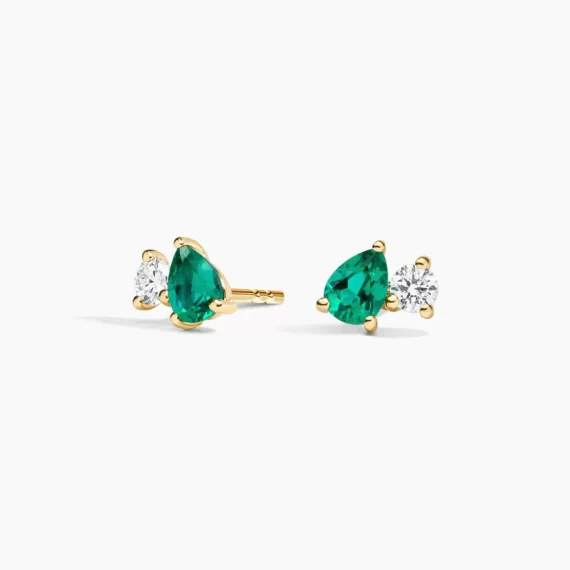 Pear shaped lab emerald earrings in toi et moi style