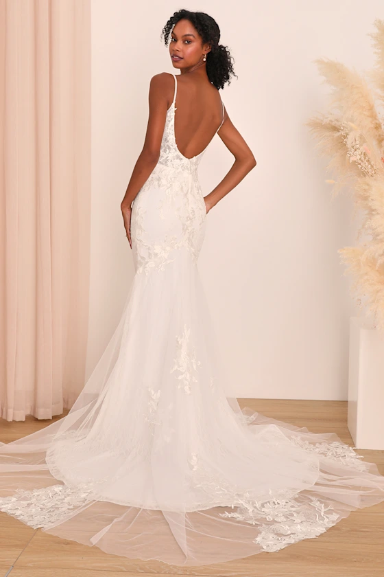 Wedding dress train adjusted during bridal gown alterations