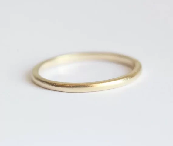 simple wedding ring band exchanged during wedding ceremony