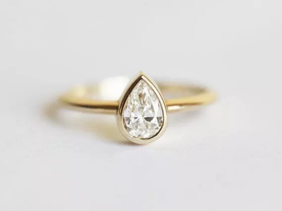 engagement ring with center stone used for marriage proposal